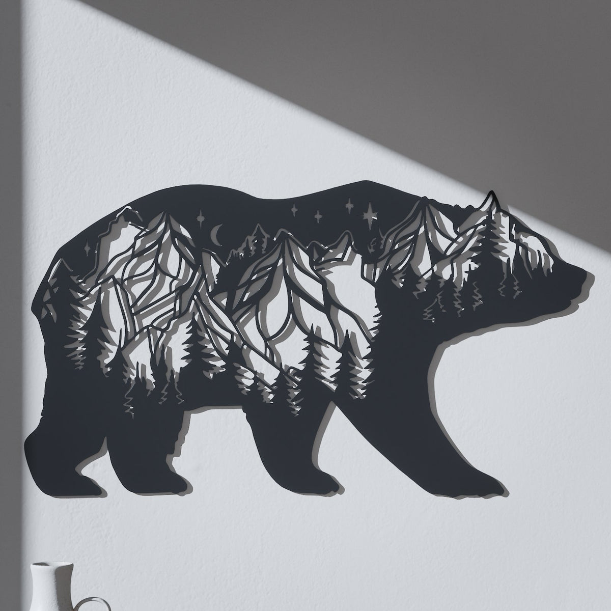 Walking bear metal wall art with a forest and mountain scene cut into black steel